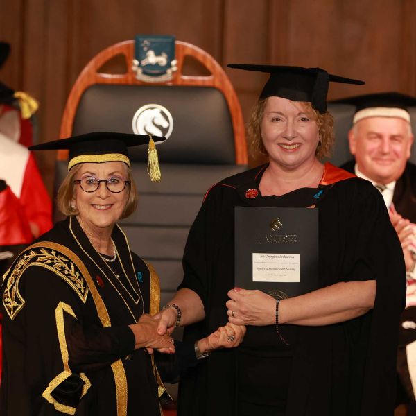 Lisa Arthurton's official graduation photo with Chancellor, the Hon Patricia Forsythe.. Broome to breakthrough: How mental health nursing became Lisa’s life calling.