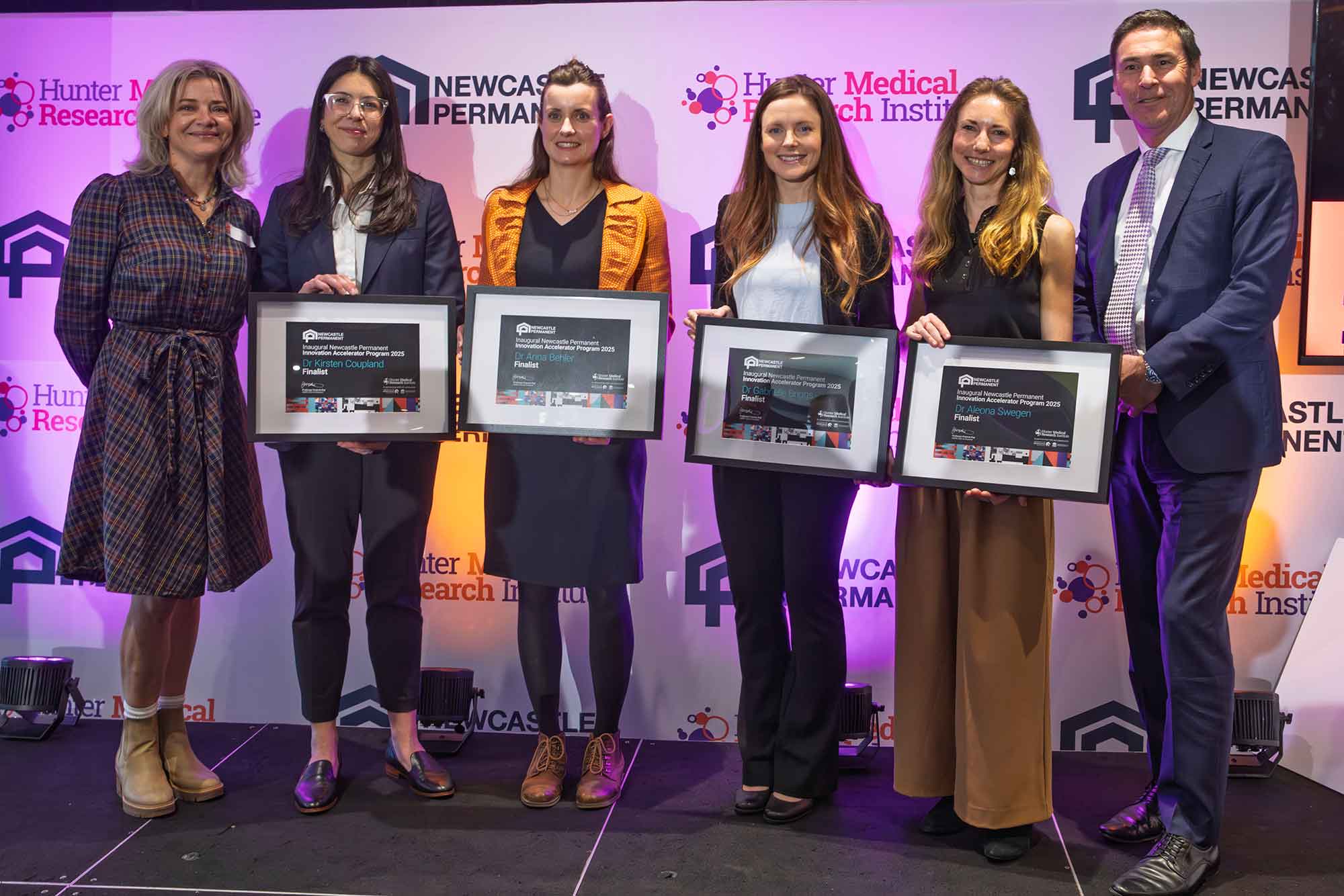 HMRI CEO and Institute Director Frances Kay, Dr Kirsten Coupland, Dr Anna Behler, Dr Gabrielle Briggs, Dr Aleona Swegan and Newcastle Permanent's Paul Juergens.