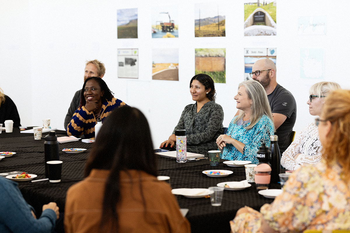 Group of people sitting around a table