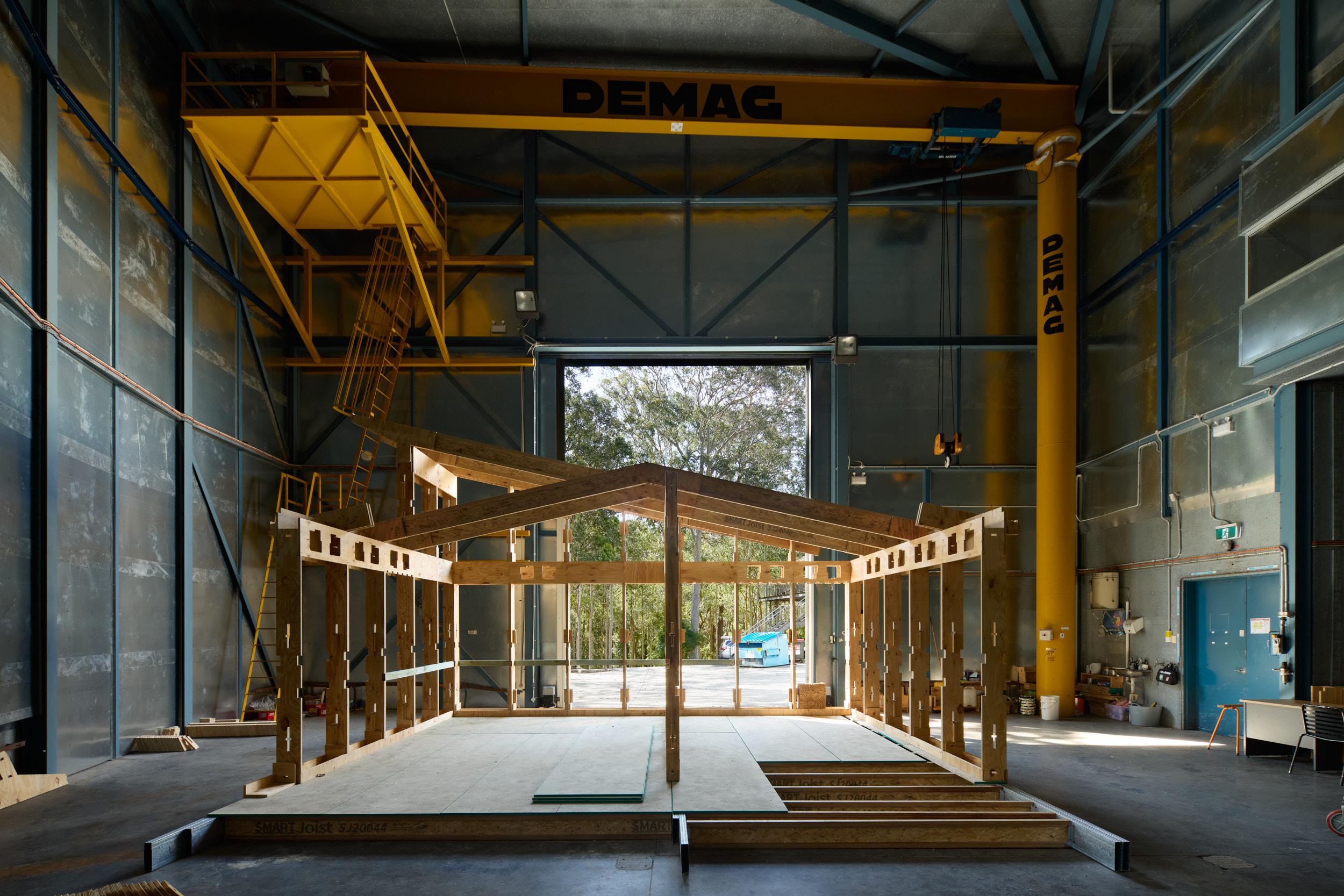 Fast Slow prototype stands in a large industrial shed