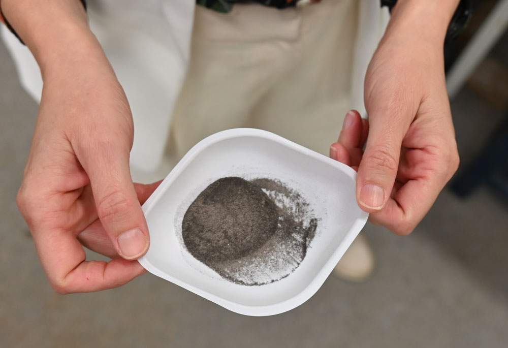 ground material reveals silver sparkles