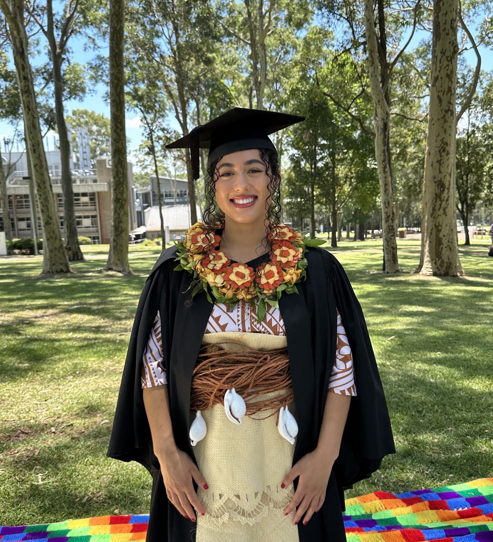 Female graduate wearing Pacific Islander cultural dress
