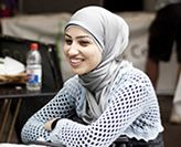 REFUGEE SYMPOSIUM web.jpg Image of woman wearing head scarf