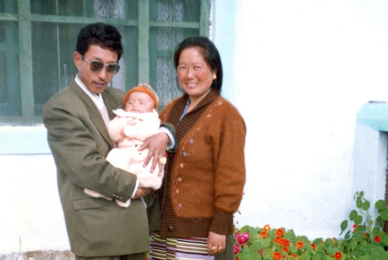Tenzin and his parents in Dharamsala, state of Himachal Pradesh in India