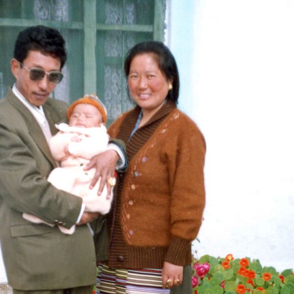 Tenzin and his parents in Dharamsala, state of Himachal Pradesh in India