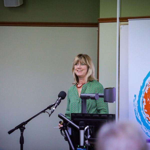 Speaker addressing audience