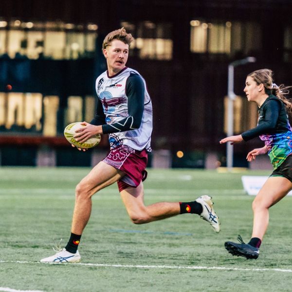 Jackson Eckford plays touch football. Team Wollotuka blitz Indigenous Nationals, including award for most promising talent.