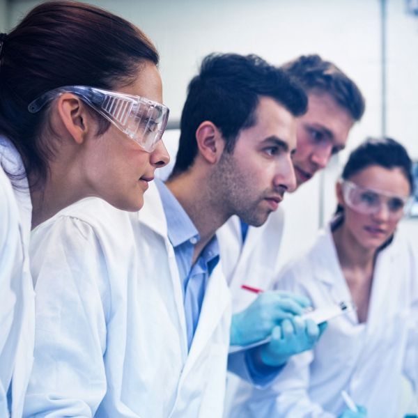 Research Integrity - Squiz Diverse group of scientists in lab coats
