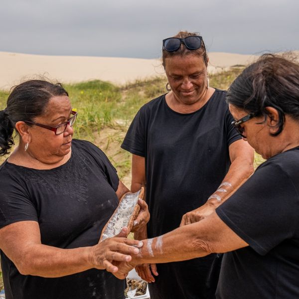 Aboriginal Health Research partner, Yeena Thompson (centre) takes part in an On-Country day on Worimi land.. Sector-first approach to Indigenous health research