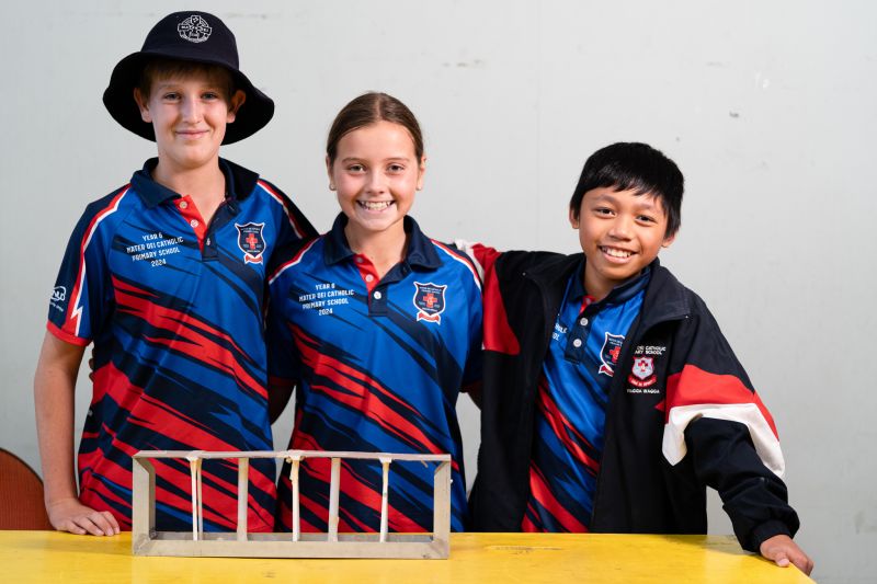 three students with their bridge