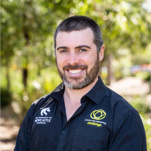 Pete Newman smiling toward the camera