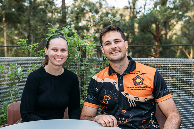 A man and woman sitting at a table