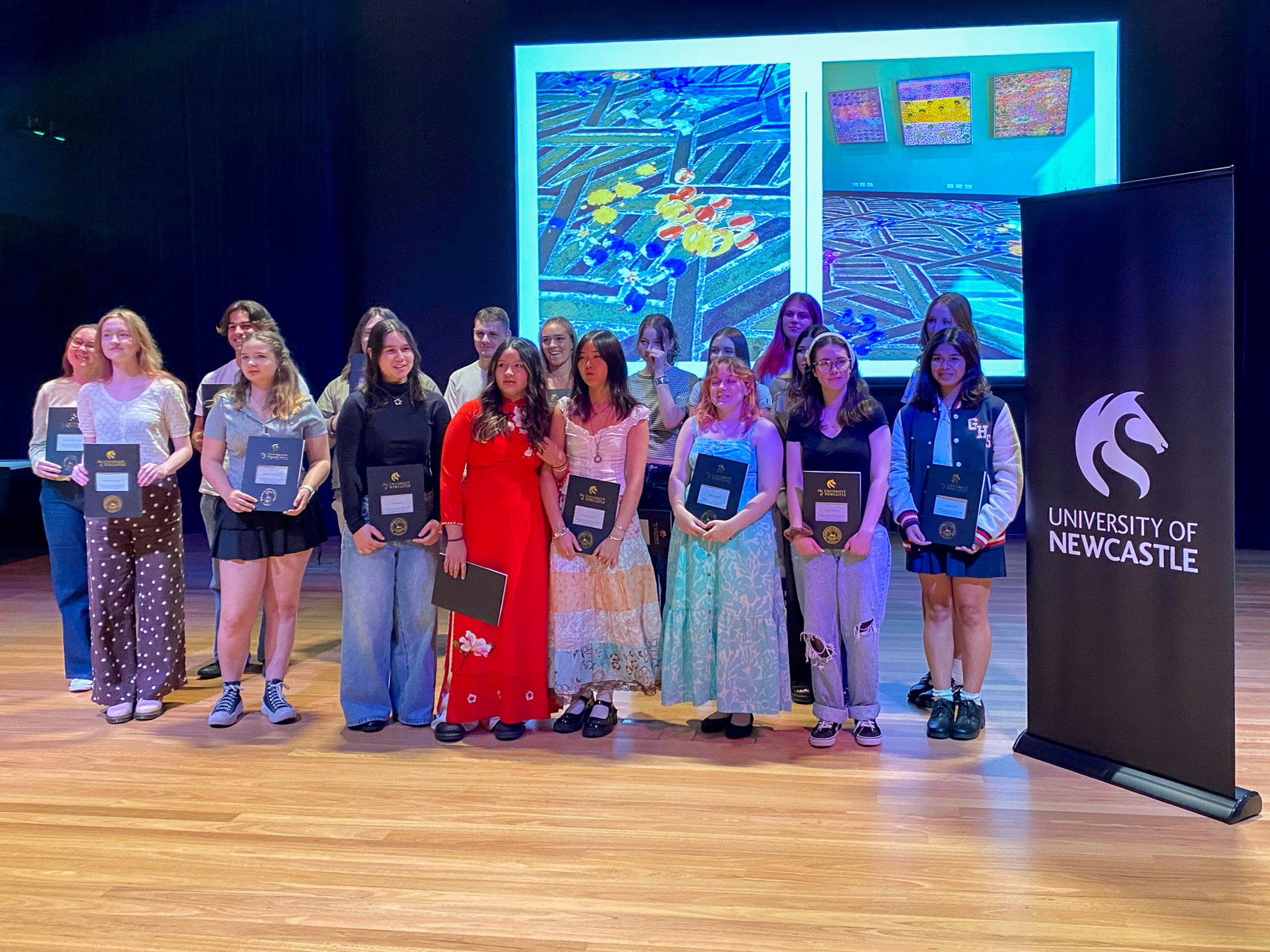 The group of 25 participating students from 10 schools