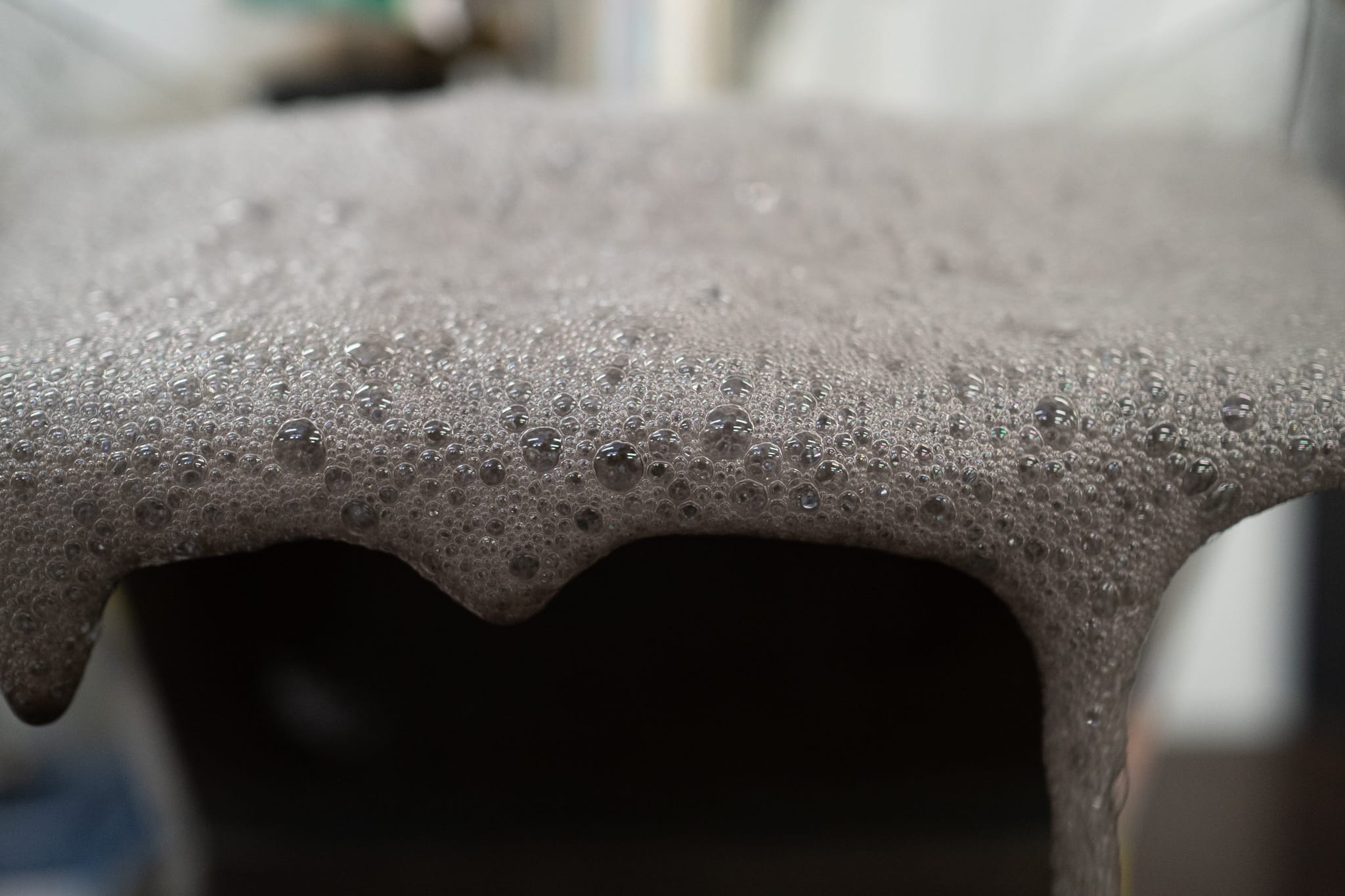 up close shot of small frothy bubbles