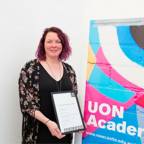 . Inspiring teacher wins $1,000 prize