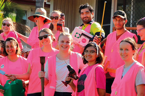A group of volunteers in hi-vis gear