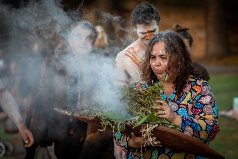 Theresa Dargin walks through the crowd as part of the cleansing.