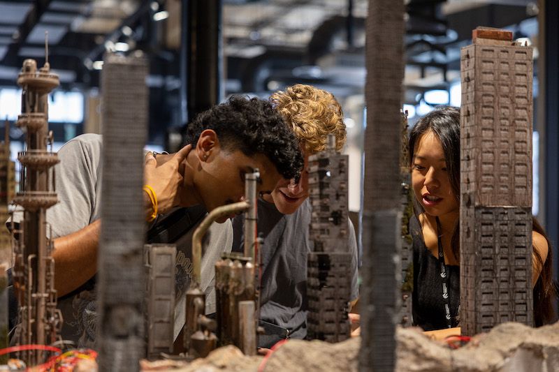 Students reviewing models