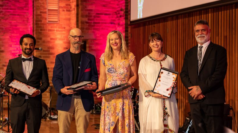 Kevin Sobel-Reid, Sam Woldemarian, Marie Hadley and Amy Maguire accept the award for staff team. School of Law and Justice: Curricular justice project is named the winners of the staff team reconciliation award.