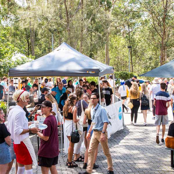 Two international students smiling