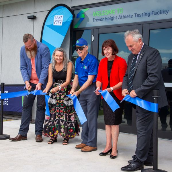 Five people stand out the front of the new sporting facility and cut a ribbon to signify the opening. Cutting-edge facility set to get the most out of athletes