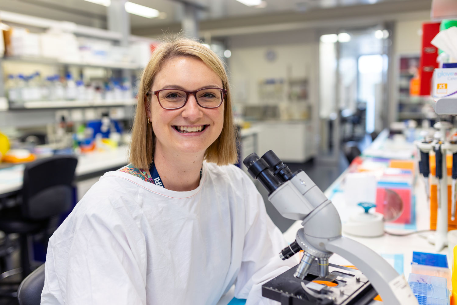 Julia Shaw at a microscope in her lab