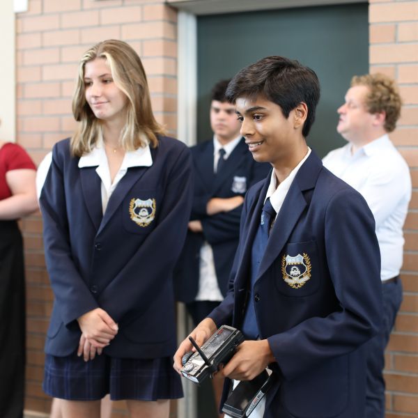 Students and teachers from Merewether High School, Rutherford Technology High School, and Warners Bay High School with Port of Newcastle's Glen Hayward, University of Newcastle's Prof. Kent Anderson and Alex Voninski, Horizon Educational's Ales Rakovsky, and Member for Newcastle, Tim Crakanthorp at the H2 Grand Prix Hunter Region launch. . Port of Newcastle supports STEM students' race towards a sustainable future in world's largest hydrogen competition.