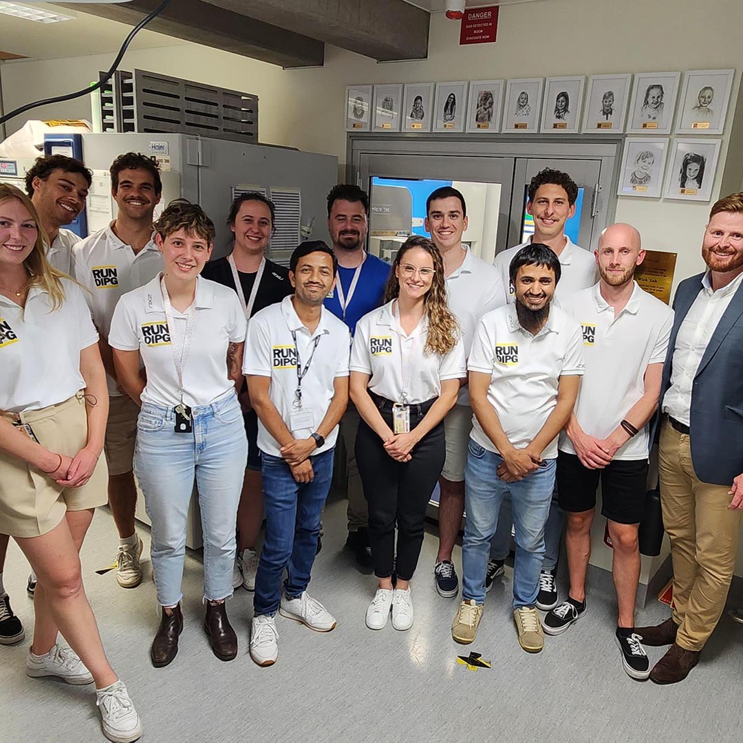 A group of people wearing lab coats