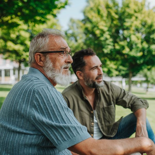 Father and his adult son. New research reveals hidden cost of supporting adult children