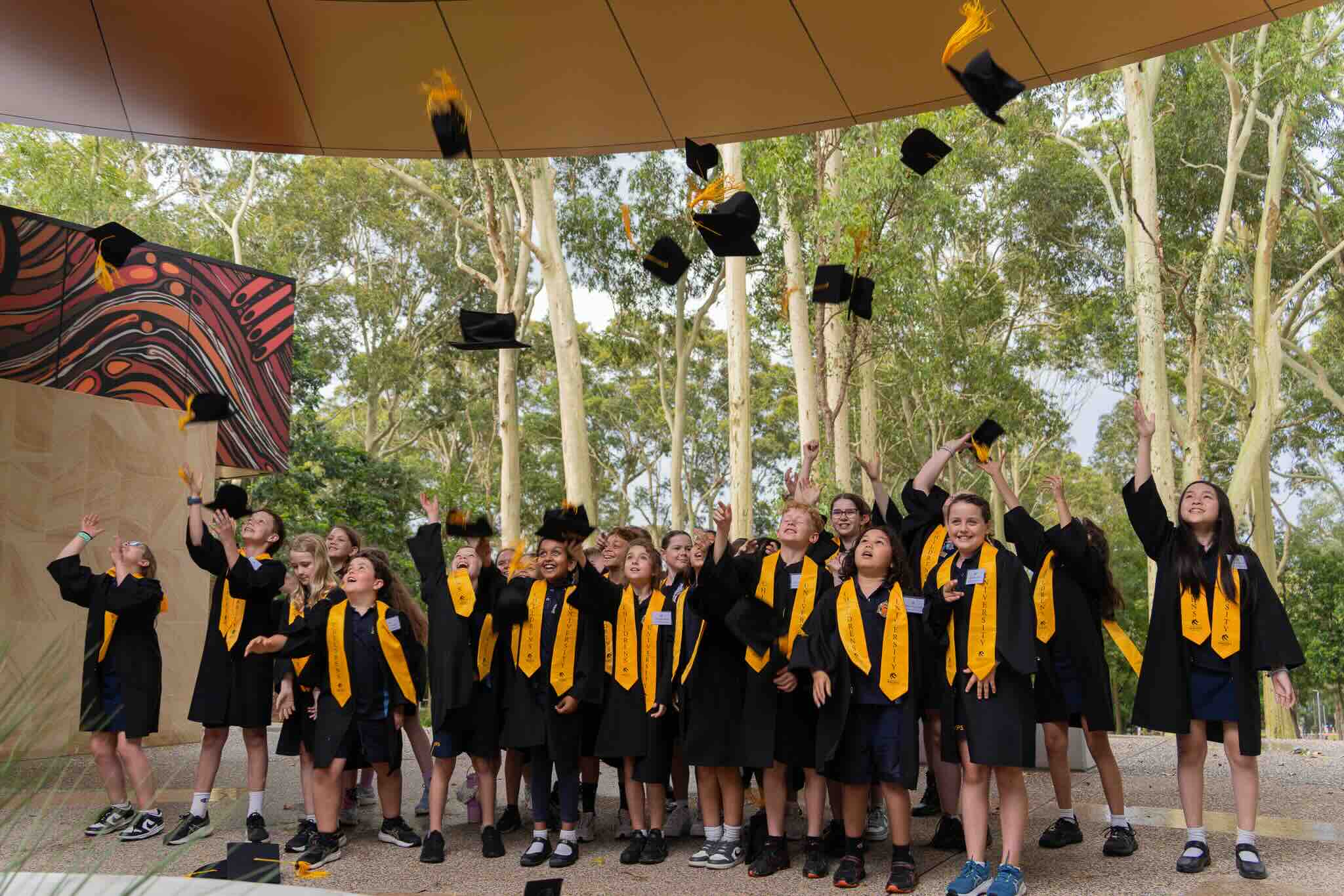 Childrens University Newcastle graduates from Elermore Vale Public School throw their hats to celebrate 2 Childrens University Newcastle graduates from Elermore Vale Public School throw their hats to celebrate 2