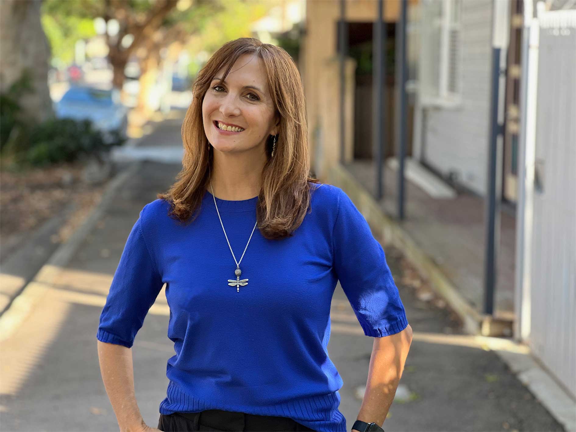 headshot of Juanita Todd outdoors and smiling