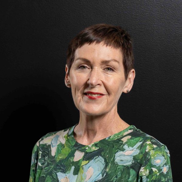 Headshot of Professor Belinda Tynan in front of a black backdrop