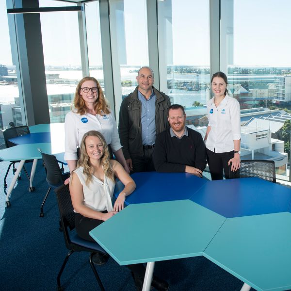 Staff at NeW Space. Proud staff prepare for NEW era