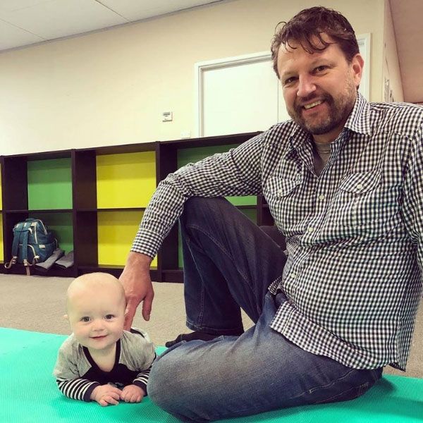 Dylan Mitchell with son. Making the choice to drive change.