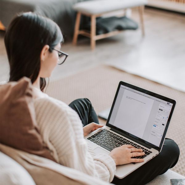 Woman typing on laptop