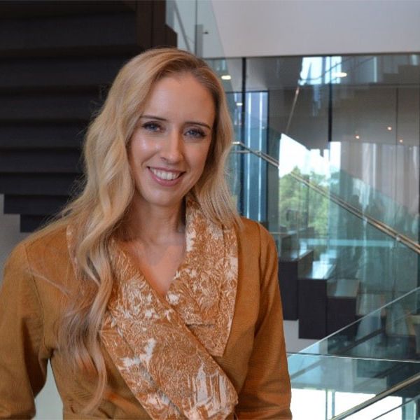 Myfanwy-Graham.jpg A smiling woman with blonde hair looking into the camera