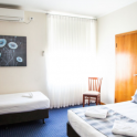 A standard twin room on campus accommodation