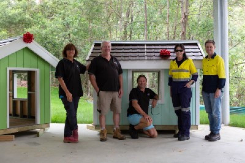 A group of students with their summer elective project