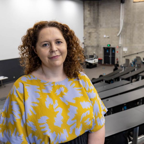Sally Patfield Sally Patfield standing in a lecture theatre