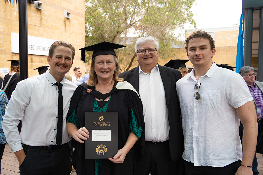 Deborah Sivis with her family at graduation