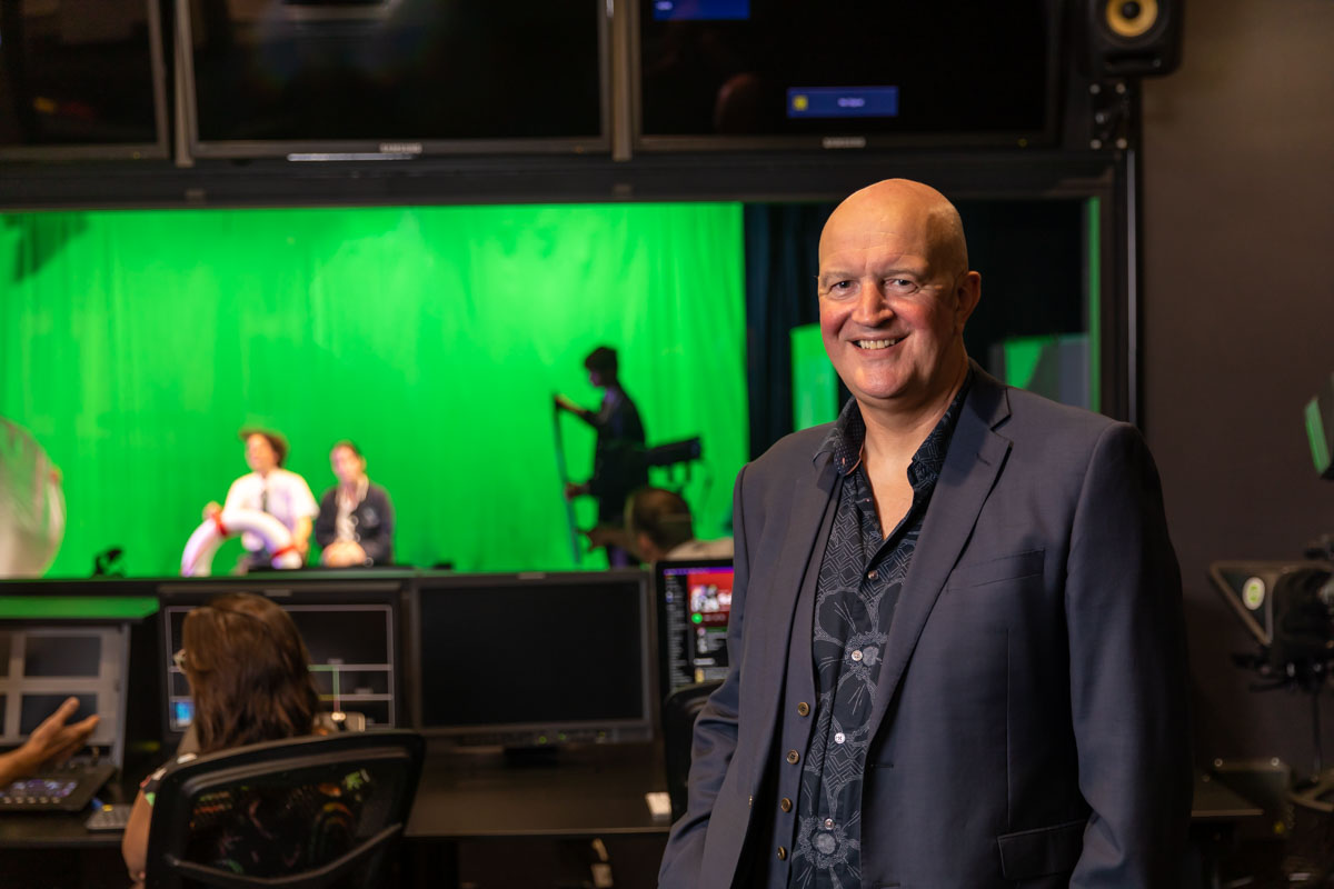 Profesor Paul Egglestone Professor Paul Egglestone stands in the studio control booth in the School of Creative Industries at Q Building.