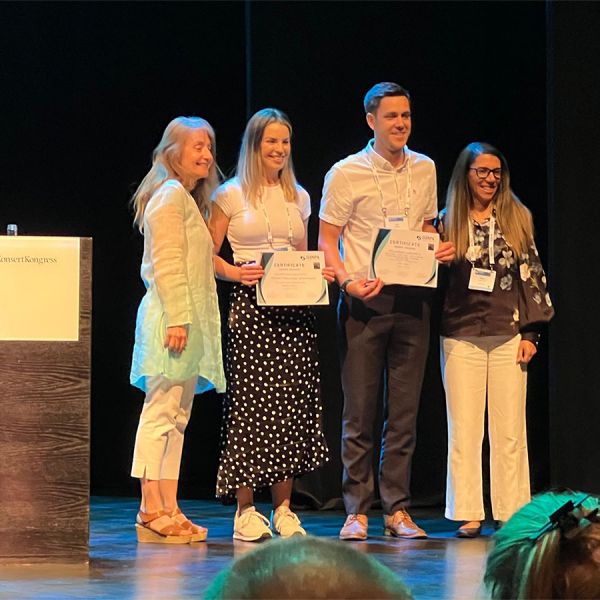 Dr Lee Ashton receives the 'best oral presentation' award at the 2023 ISBNPA Conference in Sweden for his Daughters and Dads Active and Empowered presentation