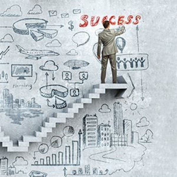 Image of person at top of stairs with directional arrow