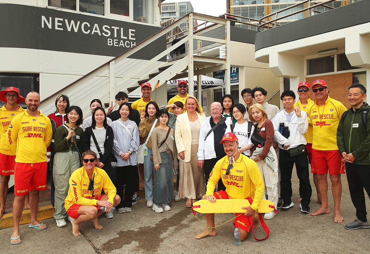 A group of students and others with lifeguards