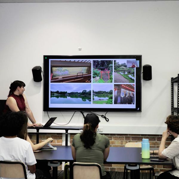 Student presenting to peers