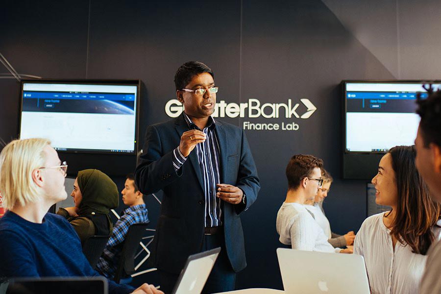 A speaker talking to students