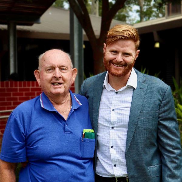 Matt and Bill smiling at the camera. Brain cancer researchers strive for a breakthrough.
