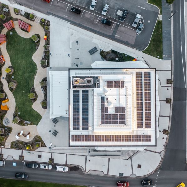An aerial photo that shows the solar panels on top of Q Building