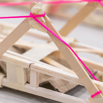 Popsicle sticks stuck together for an experiment