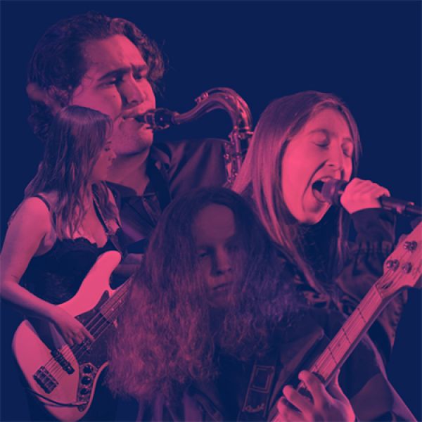 A band performing with a saxophonist, bassist, guitarist, and vocalist.